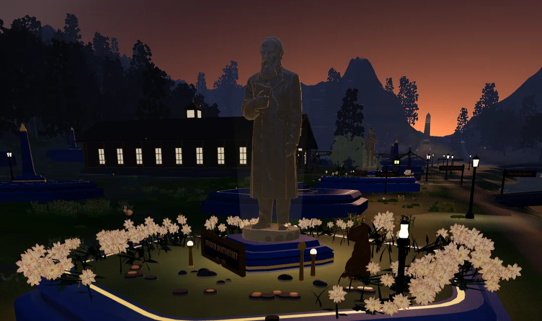 Dostoevsky's tribute plot in the Vale at golden hour: the statue over its garden, the lamps just lit